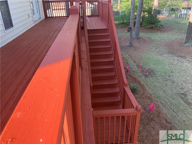 stairway featuring dark wood-type flooring