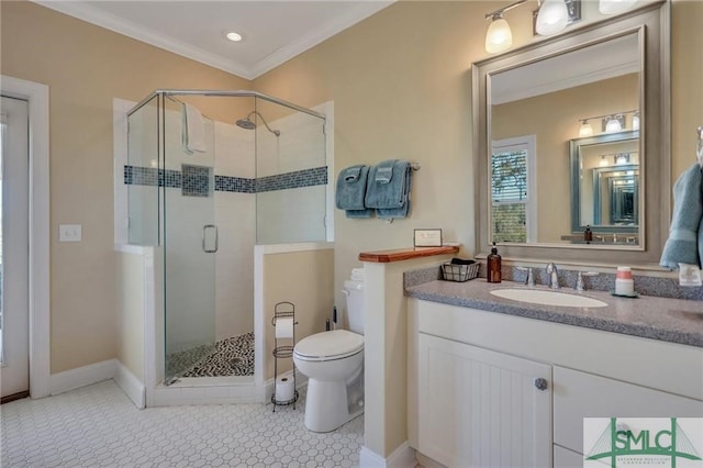 bathroom with vanity with extensive cabinet space, ornamental molding, a shower with shower door, tile flooring, and toilet