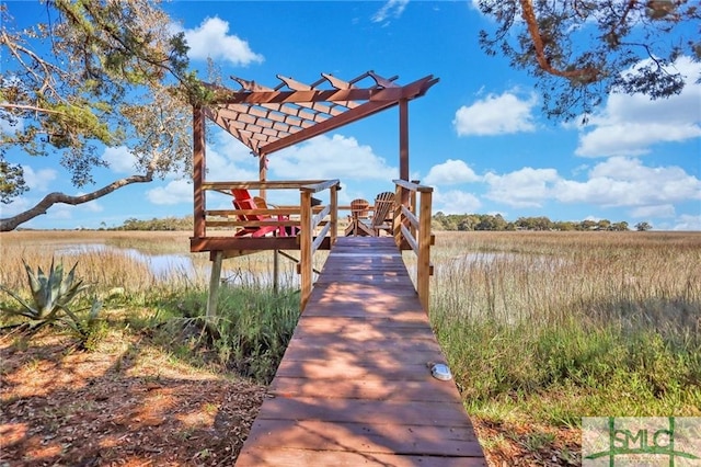 view of dock with a pergola