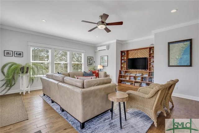 living room featuring wood-type flooring, a wall unit AC, and crown molding