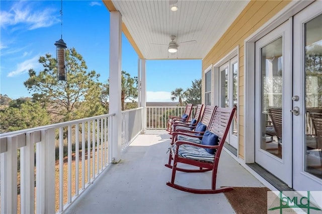 balcony featuring french doors and ceiling fan