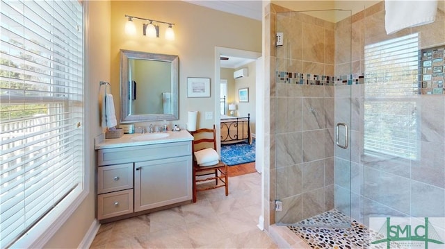 bathroom with a shower with door, tile floors, and oversized vanity