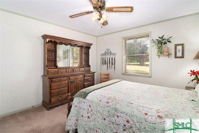 bedroom featuring light colored carpet and ceiling fan