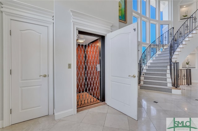 view of tiled foyer