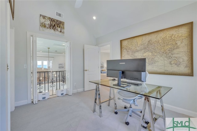 office featuring light colored carpet and high vaulted ceiling