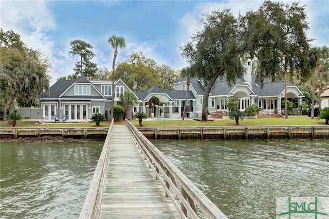 dock area featuring a water view