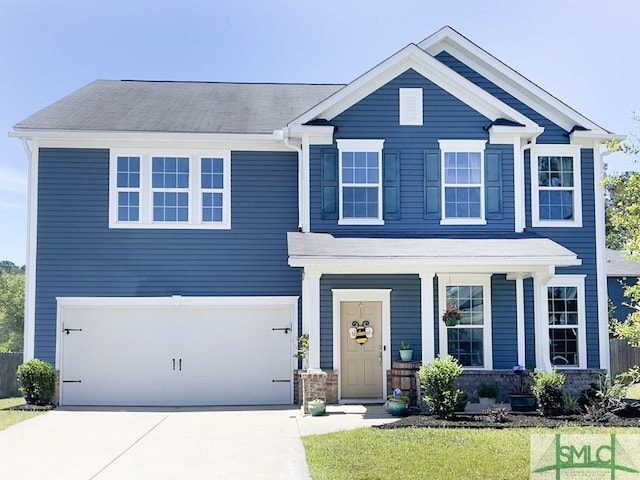 view of front of property featuring a garage