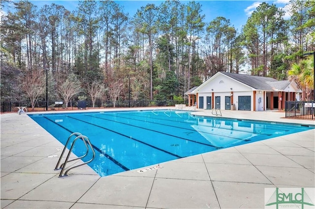 view of swimming pool featuring a patio