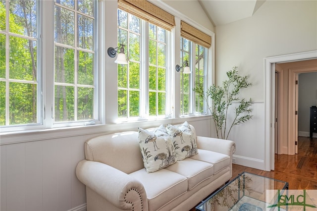 sunroom / solarium with vaulted ceiling