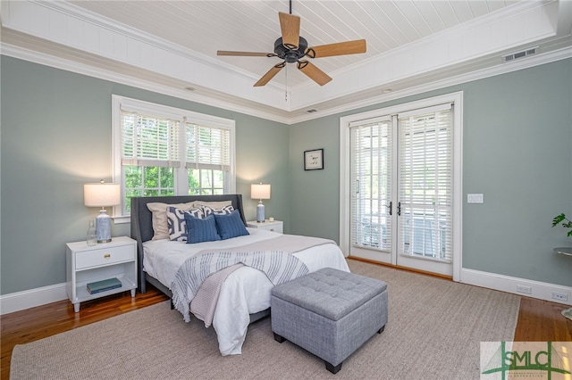 bedroom featuring access to outside, crown molding, light hardwood / wood-style flooring, and ceiling fan