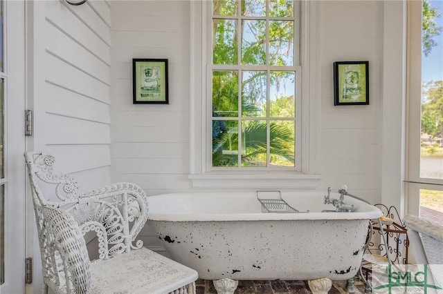 bathroom featuring a tub