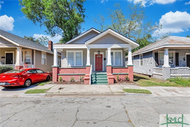 bungalow-style house featuring covered porch