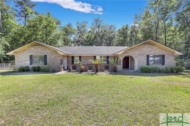 ranch-style house with a front yard