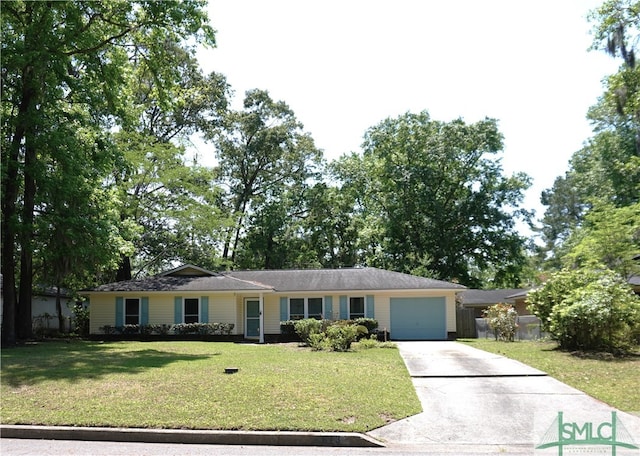 ranch-style house with a garage and a front lawn