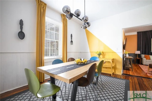 dining area with hardwood / wood-style flooring