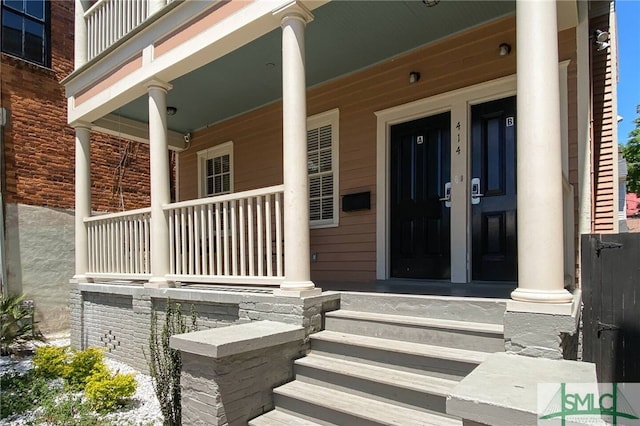 entrance to property with a porch