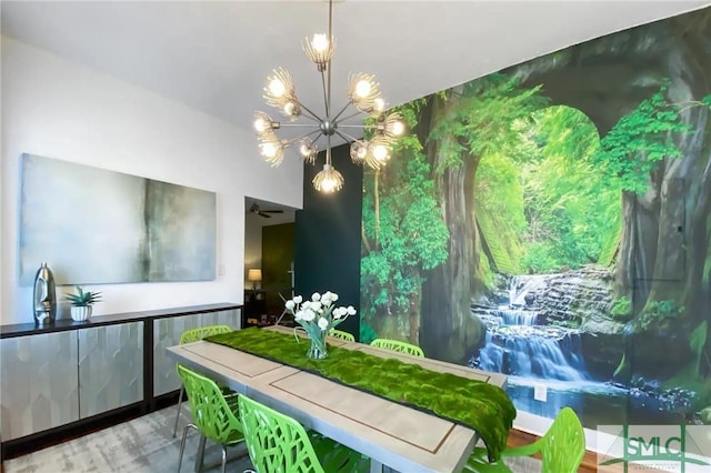 dining room with a notable chandelier