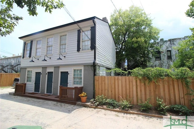 rear view of house with a patio