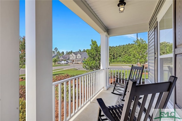 balcony featuring a porch