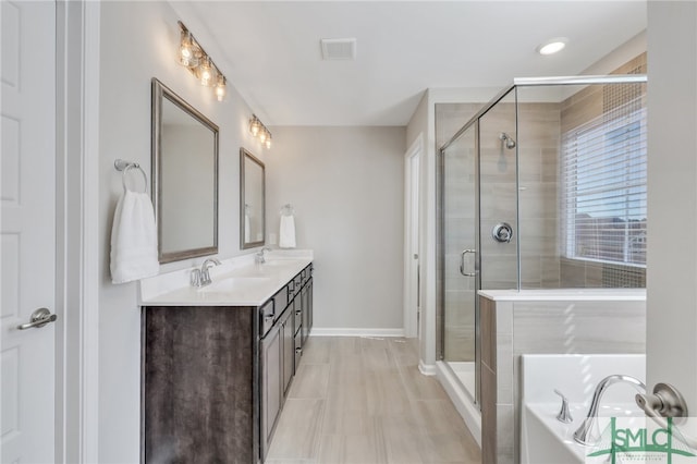 bathroom with vanity and plus walk in shower