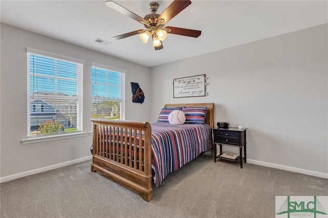 carpeted bedroom featuring ceiling fan