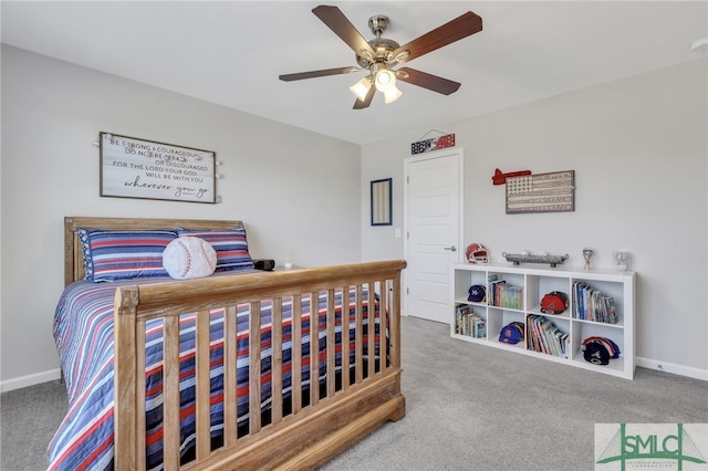 bedroom with ceiling fan and carpet floors