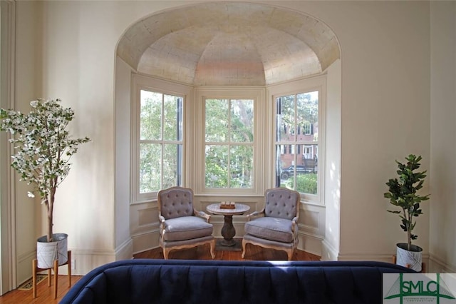 living area with hardwood / wood-style floors