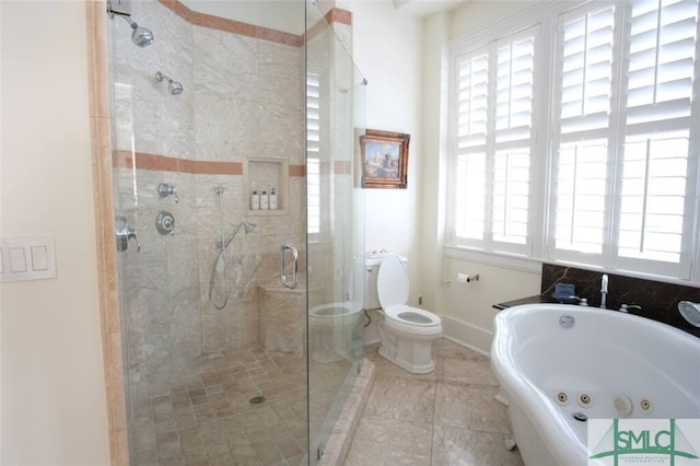 bathroom featuring tile flooring, separate shower and tub, and toilet