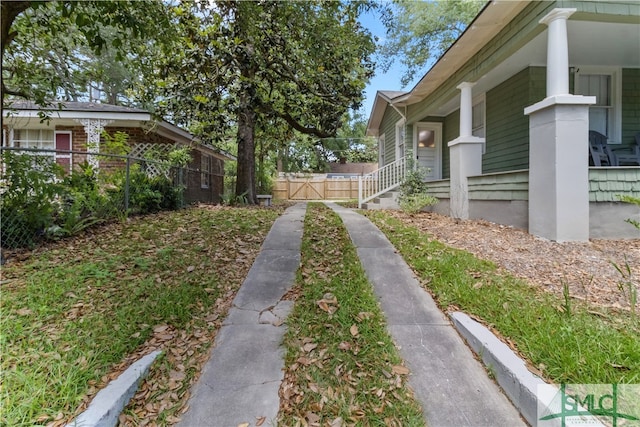 view of yard featuring a porch