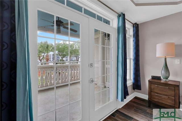 doorway featuring french doors, ceiling fan, and dark hardwood / wood-style floors