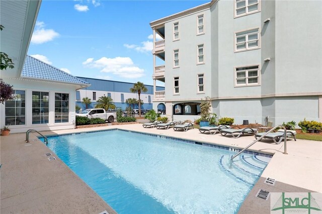 view of pool with a patio area