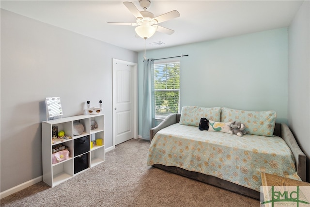 carpeted bedroom featuring ceiling fan