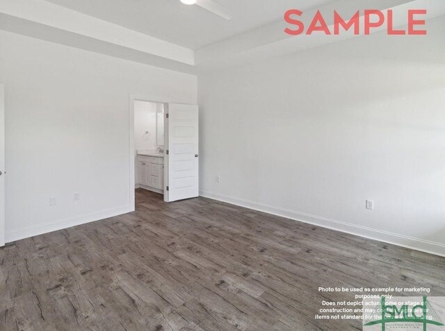 empty room with dark wood-type flooring