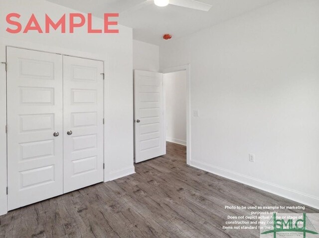 unfurnished bedroom with a closet, ceiling fan, and dark hardwood / wood-style flooring