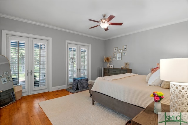 bedroom featuring light wood-type flooring, french doors, access to exterior, ornamental molding, and ceiling fan