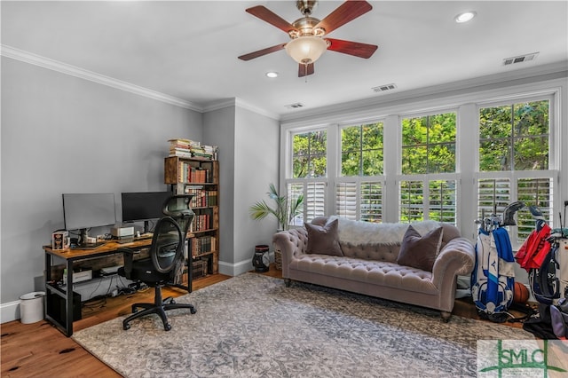 office space with hardwood / wood-style floors, ceiling fan, and crown molding