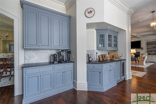 bar featuring coffered ceiling, ornamental molding, and dark hardwood / wood-style flooring