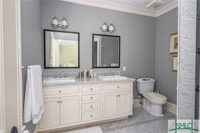 bathroom with tile flooring, double vanity, toilet, and ornamental molding