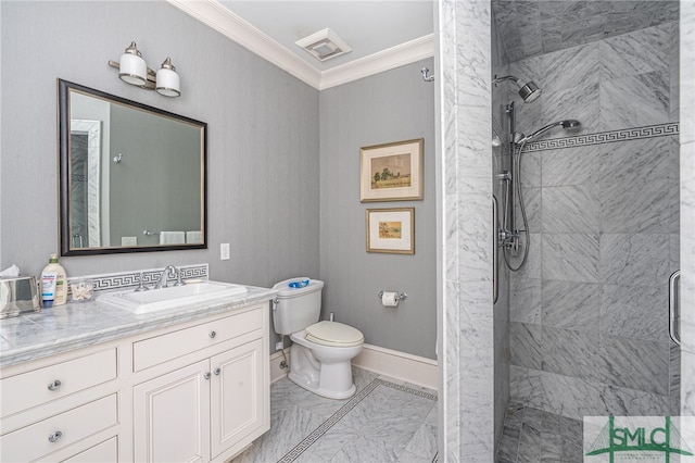 bathroom featuring tiled shower, crown molding, toilet, and oversized vanity