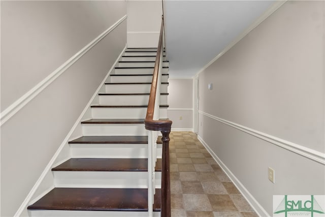 stairs featuring ornamental molding