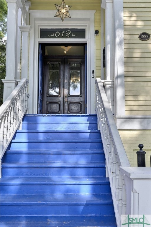 doorway to property with a porch