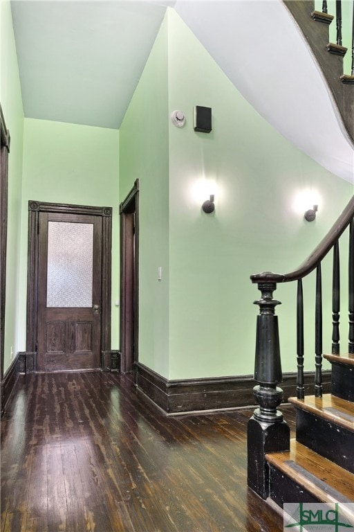 foyer entrance with hardwood / wood-style floors