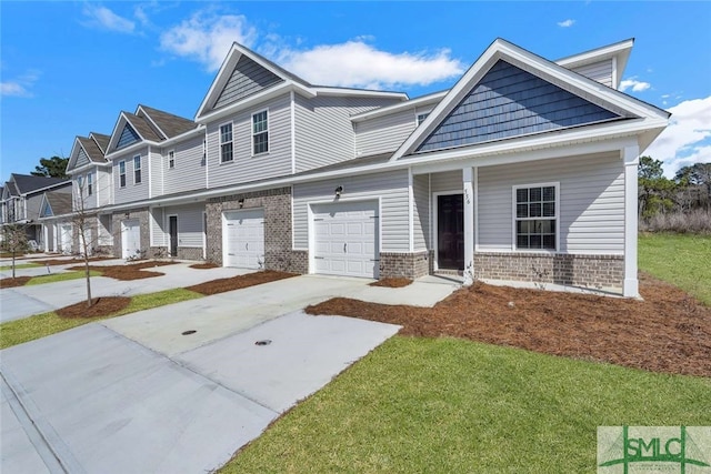 view of front facade featuring a garage and a front lawn