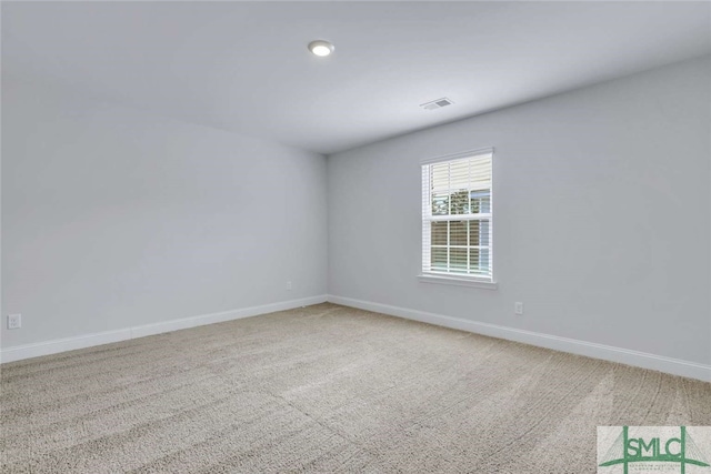 view of carpeted spare room