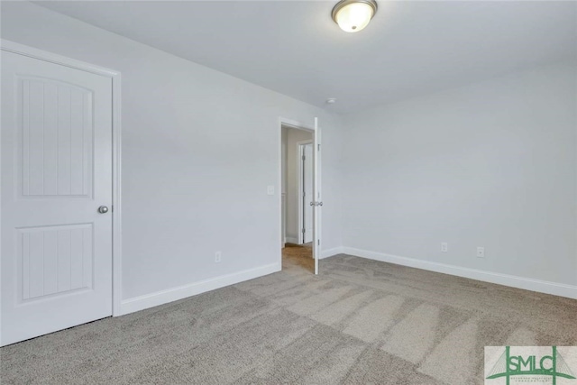 spare room with carpet floors