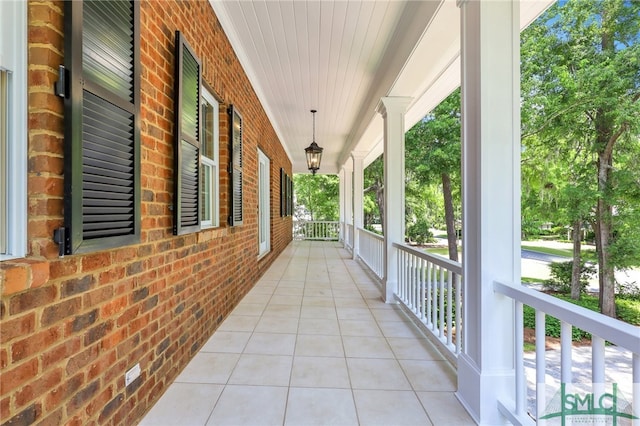 view of terrace featuring covered porch