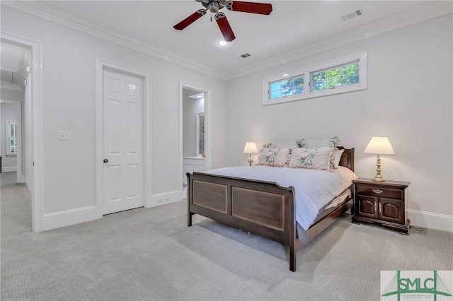 carpeted bedroom featuring ceiling fan and crown molding