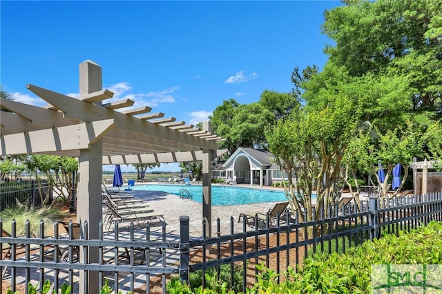 view of swimming pool featuring a pergola and a patio area