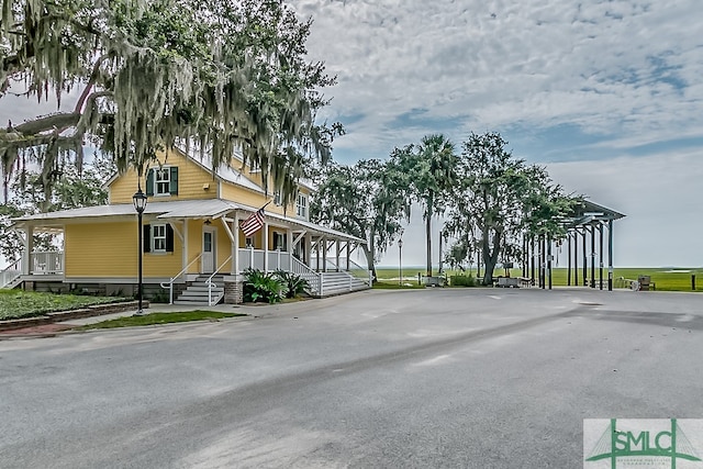 exterior space featuring covered porch