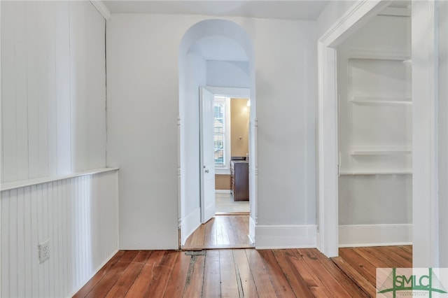 hallway featuring hardwood / wood-style flooring